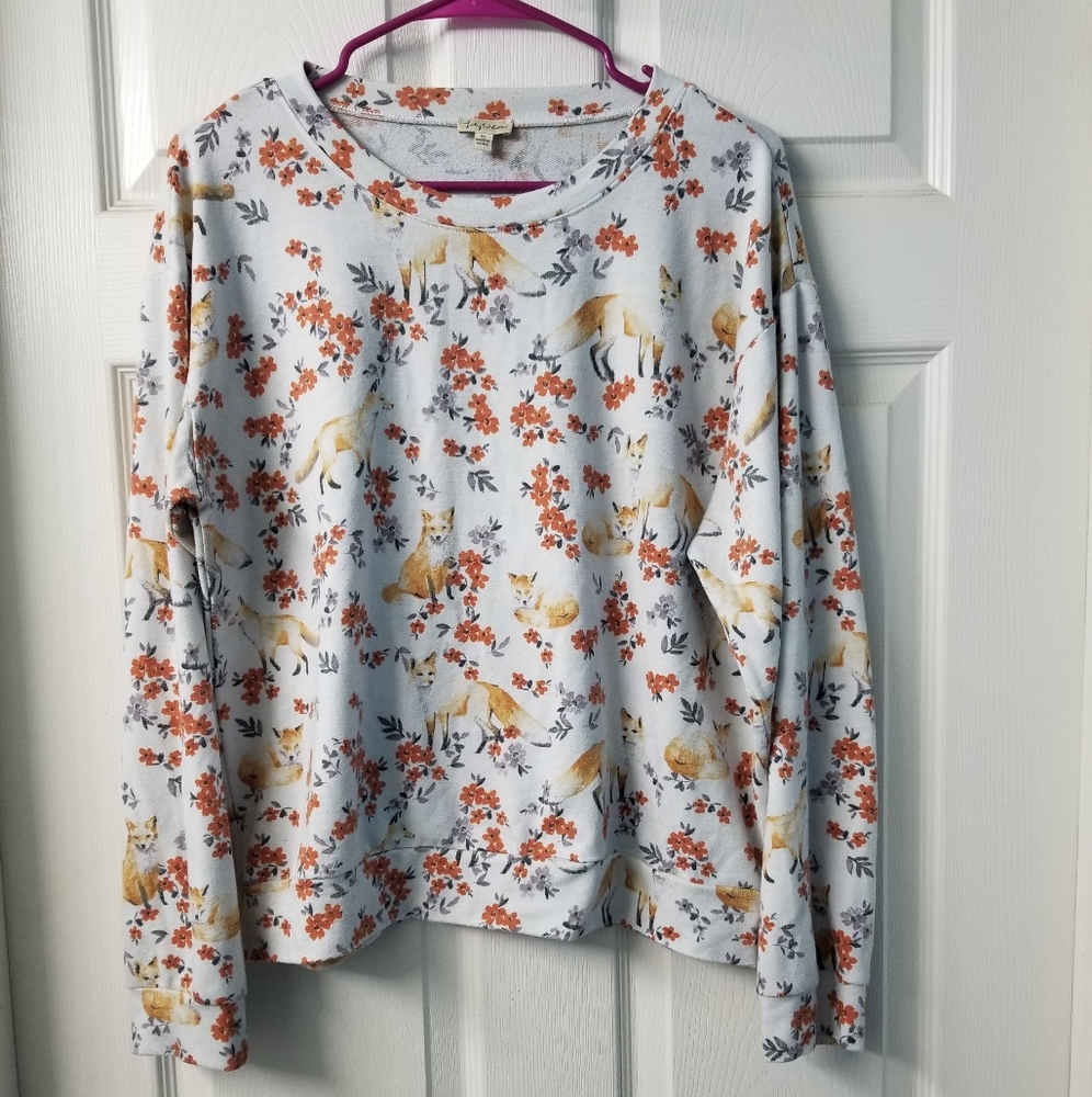 White fox pattern sweater
